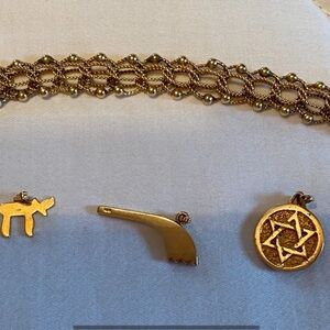 Elegant Gold Bracelet with Charms